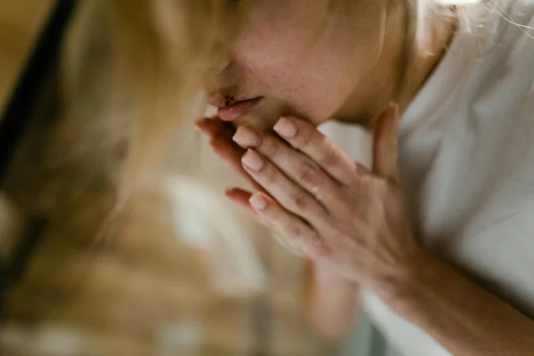Woman Handling Wound and Bleeding to Her Lip